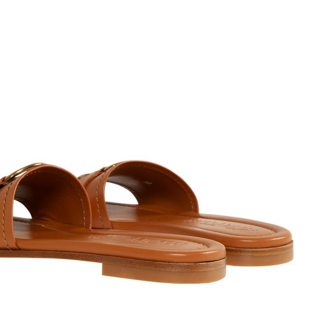 Image 3 of 4 - BROWN - MONCLER Bell Slide Shoes featuring leather upper, slip on and gold-colored metal logo ring detail. 100% leather. 