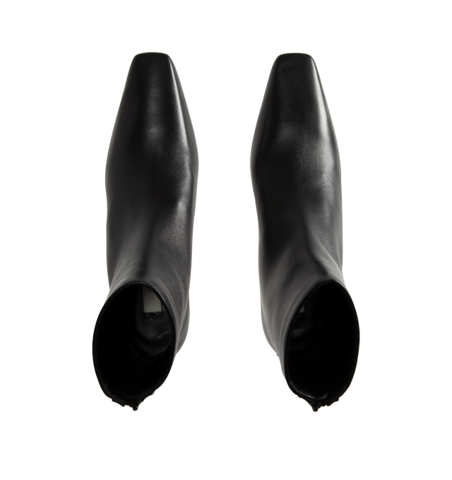 Image 4 of 4 - BLACK - Toteme Women's Nappa Mid Heel Boots are crafted from soft nappa leather and feature a minimalist, unlined construction for a second-skin fit. Designed with a sleek silhouette, they are finished with a squared pointed toe, a slanted 55mm heel, and a branded back zip fastening. Main Material: Goat Skin Leather. Lining: Sheepskin. Sole: Calf Leather. Heel Height: 55mm. Made in Italy. 