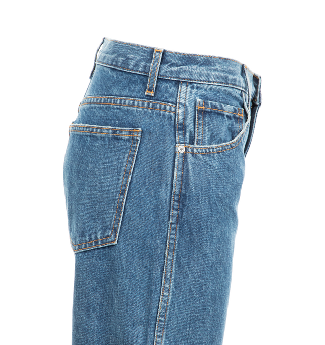 Image 3 of 3 - BLUE - Khaite Kerrie Jeans are a 5-pocket style with a curved inseam, brass buttons, and a wide-legged silhouette.    