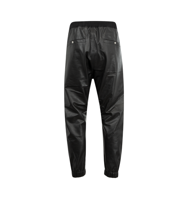 Image 2 of 3 - BLACK - Rick Owens Tecuatl Track Trousers featuring coated plain-woven organic cotton, drawstring at elasticized waistband, four-pocket styling, button fly, zip vent at elasticized cuffs, cargo pocket at outseams and horn hardware. 100% organic cotton. Made in Italy. 