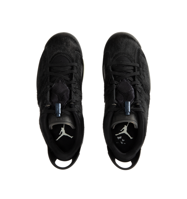 Image 5 of 5 - BLACK - JORDAN Air Jordan 6 Low Sneaker featuring leather and textile upper with pony hair and rubber sole, lace-up closure, padded low-cut collar, triple-black palette, translucent outsole and rounded toe. 