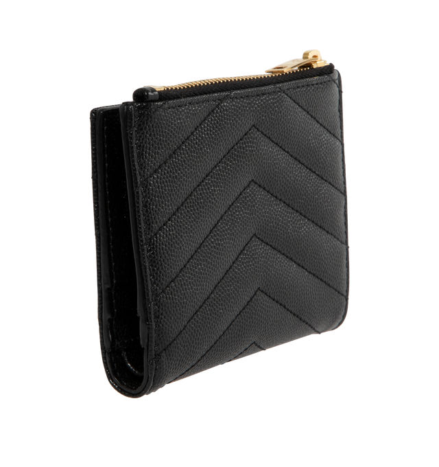 Image 2 of 3 - BLACK - SAINT LAURENT Bi Fold Wallet Card Holder featuring metal free tanned leather, decorated with interlocking cassandre, quilted overstitching gold-toned hardware, snap button fastening, one zippered coin purse, four card slots, one bill compartment and one transparent card slot. 4.1 x 3.3 x 0.9 inches. Calfskin. Made in Italy. 