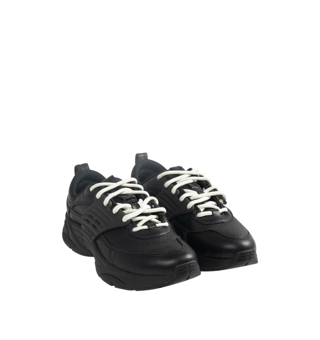 Image 2 of 5 - BLACK - Men's Jordan Trunner O/S SP Sneakers feature a leather upper with synthetic overlays, molded midfoot support wings, and signature Jordan branding for a modern athletic look. These lifestyle sneakers combine responsive Cushlon 3.0 foam cushioning, a lightweight foam midsole, and a durable rubber outsole for exceptional comfort, stability, and everyday traction. Main Material: Leather and Synthetic. Midsole: Foam with Cushlon 3.0 Cushioning. Sole: Rubber. 