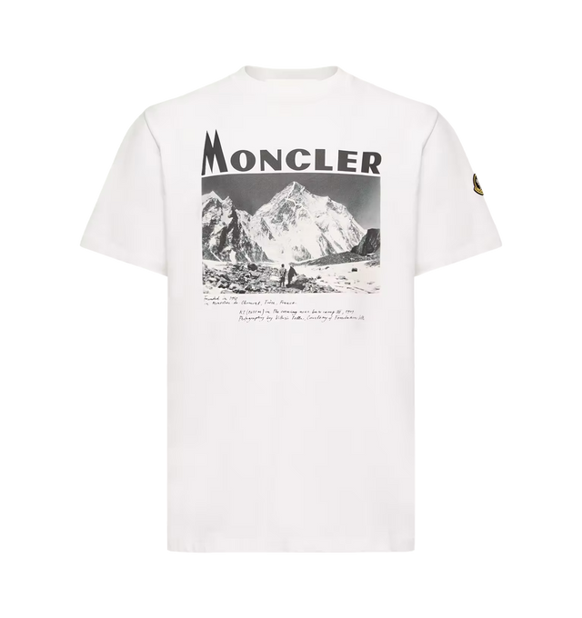 Image 1 of 1 - WHITE - Moncler Men's K2 Print Short Sleeve T-Shirt is crafted from cotton jersey and features a loose-fit silhouette, a classic crew neckline, and short sleeves. A graphic K2 print inspired by Vittorio Sella's celebrated 1909 photograph of the mountain reflects the pioneering spirit at the heart of Moncler's alpine heritage. Main Material: 100% Cotton. Collar Rib: 100% Cotton. Fit: Loose.  