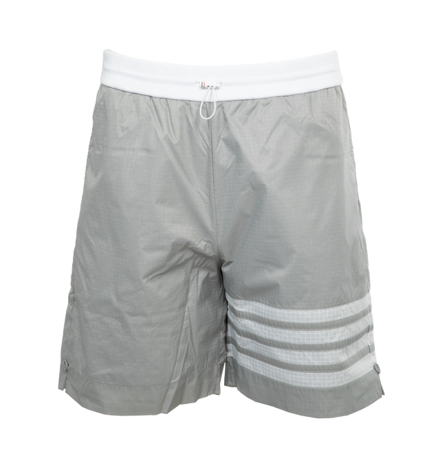 Image 1 of 4 - GREY - THOM BROWNE Mid Thigh 4 Bar Short featuring striped print, logo at the back, logo at the back label, knee length, side pockets. 100% polyamide.