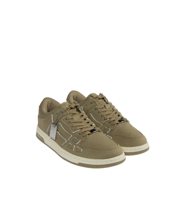 Image 2 of 5 - GREEN - AMIRI Chunky Canvas Skeleton Low-Top Sneakers featuring appliqu details and paneling, round toe and lace-up style. Cotton upper. Rubber sole. 
