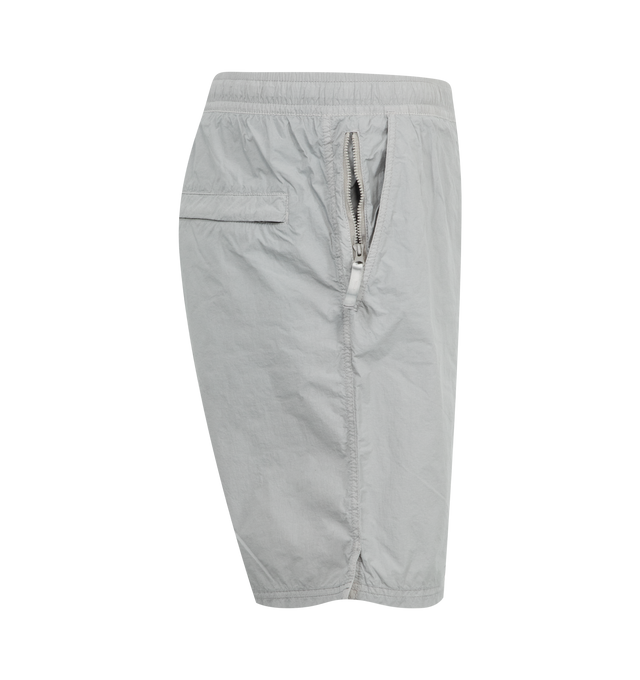 Image 3 of 3 - GREY - STONE ISLAND Shorts featuring side pockets, two back welt pocket, Stone Island patch Compass logo on the left leg, elasticated waistband and drawstring. 100% polyamide/nylon. 