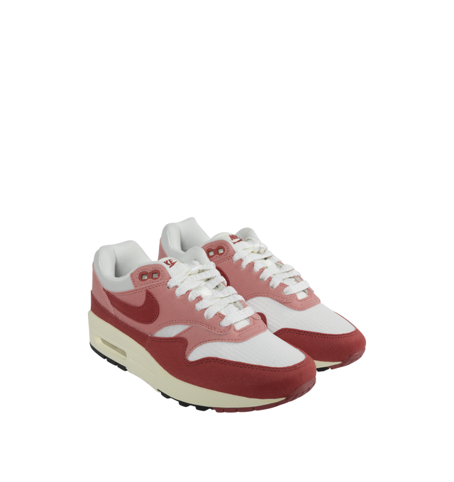 RED - NIKE Air Max 1 '87 Sneaker featuring cushioning that absorbs impact and distributes weight for consistent, buoyant comfort under each step, removable insole, visible Max Air unit in the heel provides clear Air-Sole cushioning and leather and textile upper/synthetic lining/rubber sole.