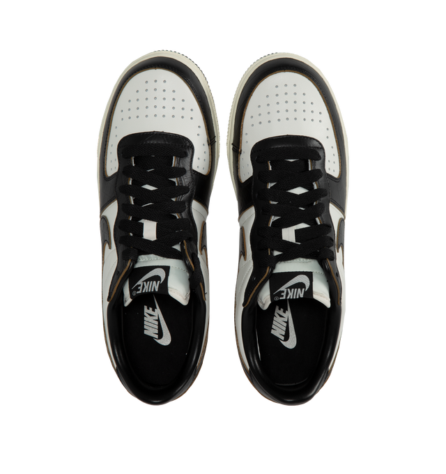 BLACK - NIKE TERMINATOR LOW PRM features leather and suede in upper, rubber outsole, perforations on toe, padded collar, exposed stitching on side panels and foam midsole.