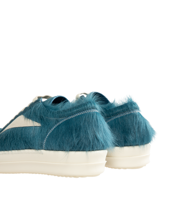 Image 3 of 5 - BLUE - Rick Owens Men's Vintage Sneaks are crafted from hairy suede and full-grain calf leather and feature an under-ankle silhouette with contrast stitching, a padded ankle, and the brand's signature shark-toothed bumper sole. Designed with eight-eyelet lace-up fastening, a toe cap, and a resized triangular leather appliqu at the side for a distinctive vintage-inspired look. Main Material: 100% Calf Leather. Lateral Details: 100% Cow Leather. Lining: 100% Calf Leather. Insole: 100% Calf Leat 