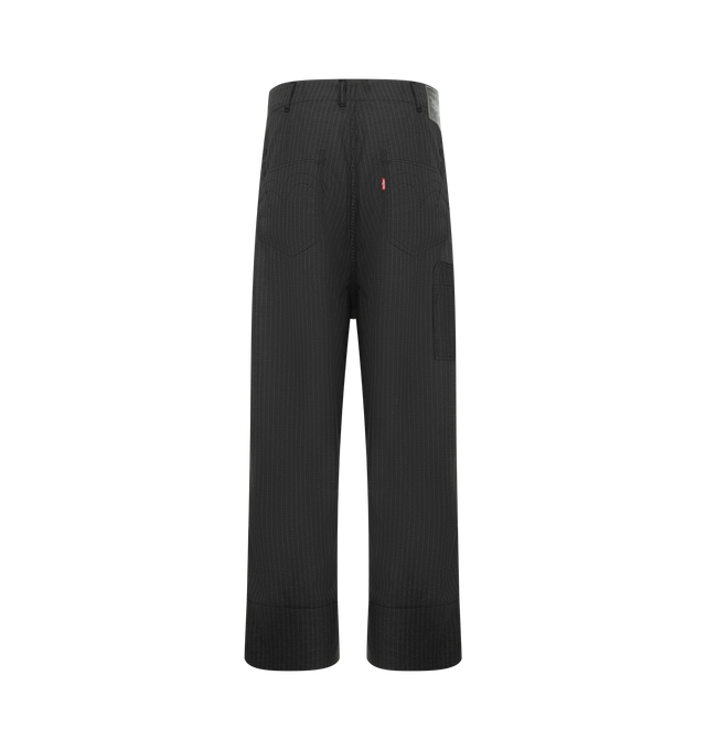Image 2 of 3 - BLACK - JUNYA WATANABE Levi's Pinstripe Trousers featuring front button waist closure, two front pockets, wide leg, cuffed ankles, pin stripe fabric, Levi's tab label at rear pocket and leather patch at waist. 50% polyester, 50% viscose. Made in Japan. 