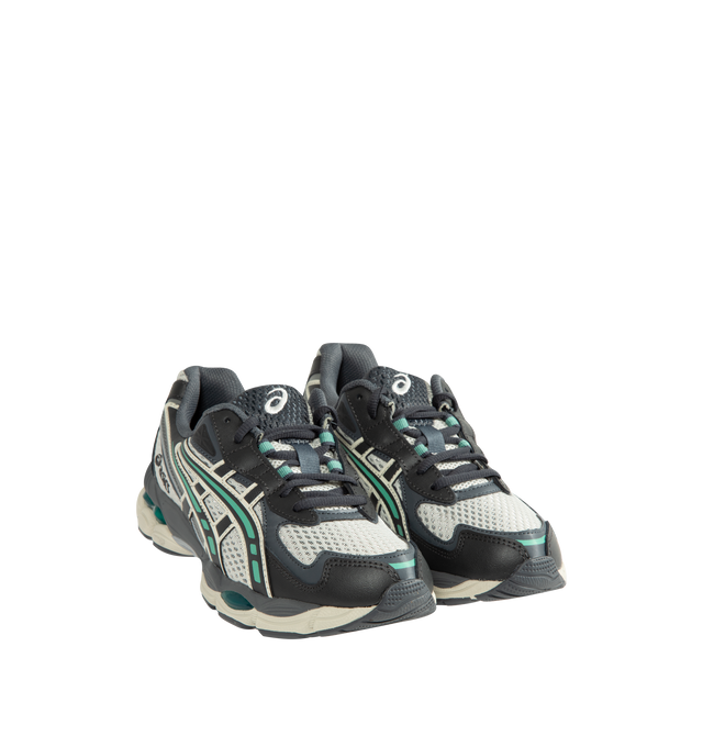 Image 2 of 5 - GREY - ASICS GEL-NYC 2055 Sportstyle sneaker with early 2000s running shoe design influences in the upper's ASICS stripes, heel counter, and eyelet structure. Featuring GEL-CUMULUS 16 shoe's tooling system. Through a combination of lightweight foams and GEL technology inserts, this midsole formation helps create advanced underfoot comfort. Unisex style in men's sizing. Imported from Cambodia. 