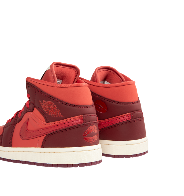 Image 3 of 5 - RED - JORDAN Air Jordan 1 Mid SE Sneaker featuring leather in the upper, encapsulated Nike Air-Sole unit provides lightweight cushioning, rubber in the outsole, lace closure, wings logo on collar and Jumpman on tongue. 