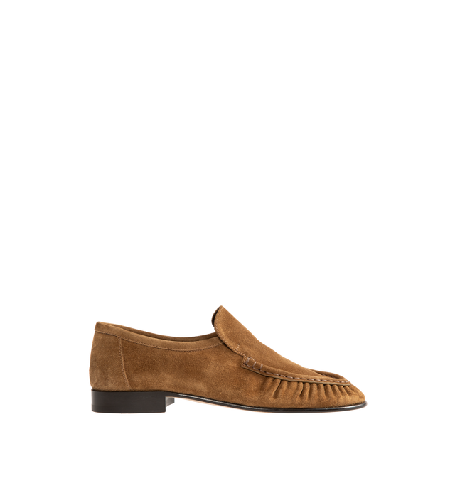 Image 1 of 4 - BROWN - THE ROW Soft Moccasin Two featuring moccasin loafer in soft calfskin suede with oval toe, topstitched front detailing with natural pleating effect and stacked leather heel. 0.8 in. heel. 100% calfskin suede. Lined in 100% goatskin leather. Calfskin leather sole. Made in Italy. 