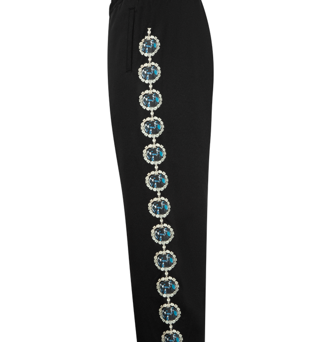 Image 4 of 4 - BLACK - PLEASURES x Richard Bernstein Mythic Hope Track Pants featuring giant jewels cascade down the legs, relaxed fit, elastic waist with internal drawcord, side-seam pockets and back patch pocket. 100% polyester. 