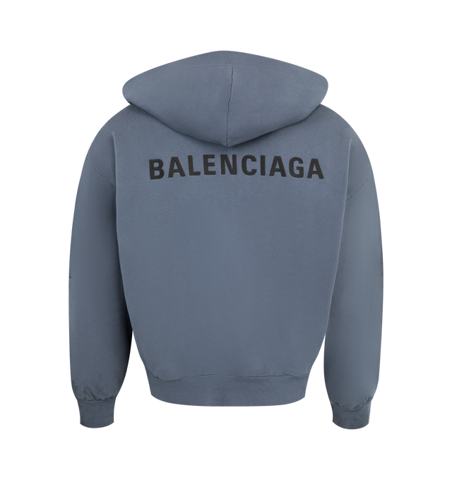 Image 2 of 2 - BLUE - BALENCIAGA Zip-Up Hoodie Regular Fit featuring painted dry fleece, hood without drawstring, zipped front, dropped shoulders, 2 pockets at front, gathered at cuffs and waistline and Balenciaga Back embroidery at front and back. 100% cotton. Made in Portugal.  