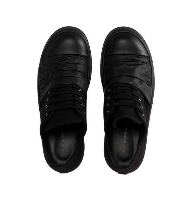 Image 5 of 5 - BLACK - Rick Owens DRKSHDW Hustler Low Sneaks Sneakers featuring cap toe, lace-up closure, extended tongue, eyelets vents at inner side and treaded rubber sole. Upper: textile. Sole: rubber. Made in Italy. 