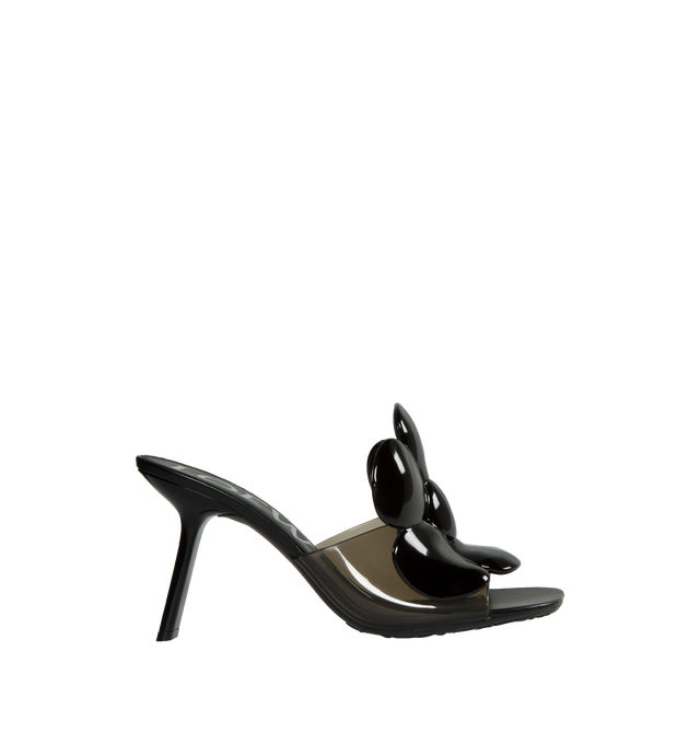 Image 1 of 4 - BLACK - LOEWE PAULA'S IBIZA Petal Flower Sandal in PVC featuring a transparent upper with an oversized glossy rubber flower embellishment, tonal lacquered Petal heel and LOEWE Anagram rubber outsole. 90mm heel. PVC. Made in Italy. 