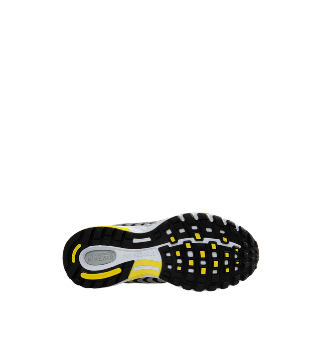 Image 4 of 5 - YELLOW - Nike Air Pegusus 205 running shoe featuring waffle-inspired tread that helps grip the ground beneath your feet, while full-length Nike Air cushioning softens each step. This white, balck and yellow edition has the same responsiveness and neutral support you love, with a layered look inspired by early-noughties runners. 