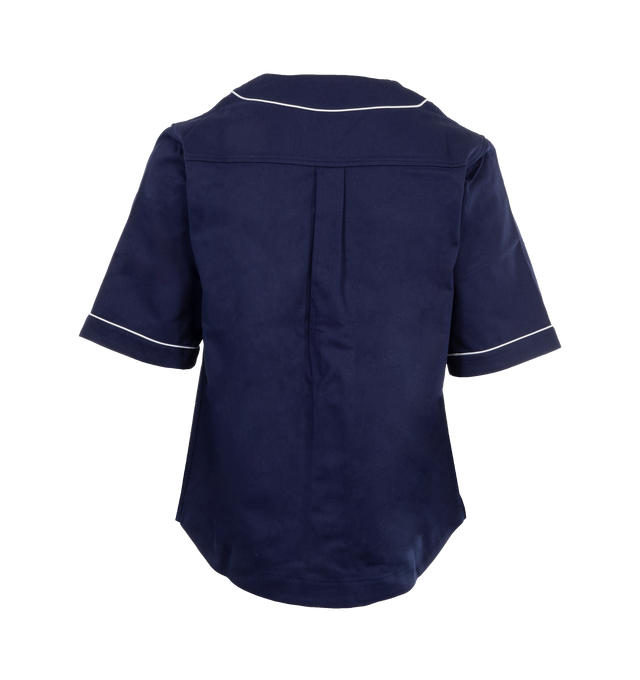 Image 2 of 2 - NAVY - Wales Bonner Freestyle Shirt renders an iconic baseball silhouette in a cotton drill fabric detailed with custom silver buttons, contrast piping, and an embroidered Wales Bonner monogram. Relaxed Fit. Made in Portugal. 100% Cotton. 