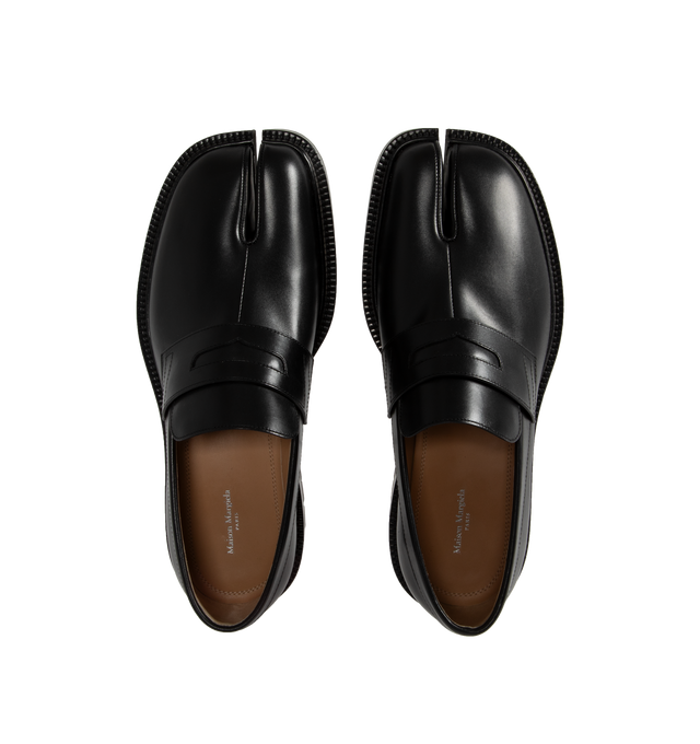 Image 4 of 4 - BLACK - Maison Margiela Tabi County loafer is crafted from calf leather with a cleated sole and feature the Tabi split-toe, inspired by the traditional 15th century Japanese sock bearing the same name. Outer: Calf Leather 100%, Sole: Calf Leather 100%, Lining: Lambskin 100%. 