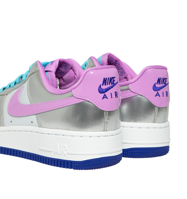 Image 3 of 5 - MULTI - Nike Women's Air Force 1 '07 WNBA Sneakers feature a genuine and synthetic leather upper with textile accents and a perforated toe box for breathable comfort and a timeless look. Celebrating the WNBA with a cosmic-inspired design, these lifestyle sneakers combine lightweight Nike Air cushioning with a durable rubber outsole featuring classic pivot-circle traction for everyday wear. Main Material: Genuine Leather, Synthetic Leather, and Textile. Midsole: Foam with Nike Air Unit. Sole:  