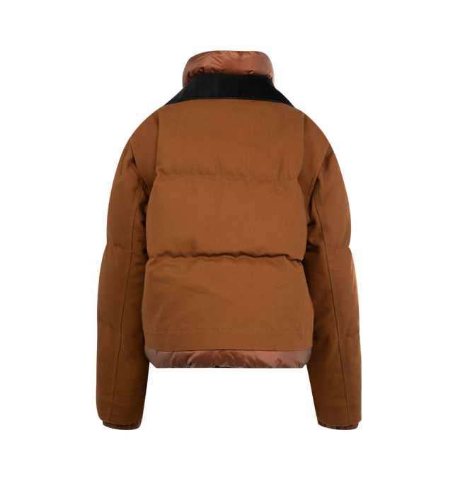 Image 2 of 3 - BROWN - Sacai x Carhartt WIP Duck Puffer Jacket in a boxy, cropped fit and layered silhouette combining a signature canvas exterior with a plush quilted nylon interior. Features stand collar and spread collar, long sleeves, elasticized snap cuffs, chest zip pocket, side patch pockets, concealed snap, two-way front zip closure, finished with a co-branded woven label. Cotton outer, 100% nylon and 100% cupro lining, 90% duck down/10% duck feather fill. Made in Japan. 
