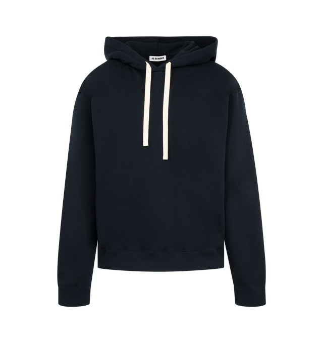 Image 1 of 3 - BLUE - Jil Sander Mens Logo Print Hoodie is crafted from cotton with a soft fleece lining. Features a relaxed fit, dropped shoulders, long sleeves, hood, ribbed cuffs, front contrast logo print, and embroidered headband accent. Main Material: 100% Cotton. Made in Italy. 