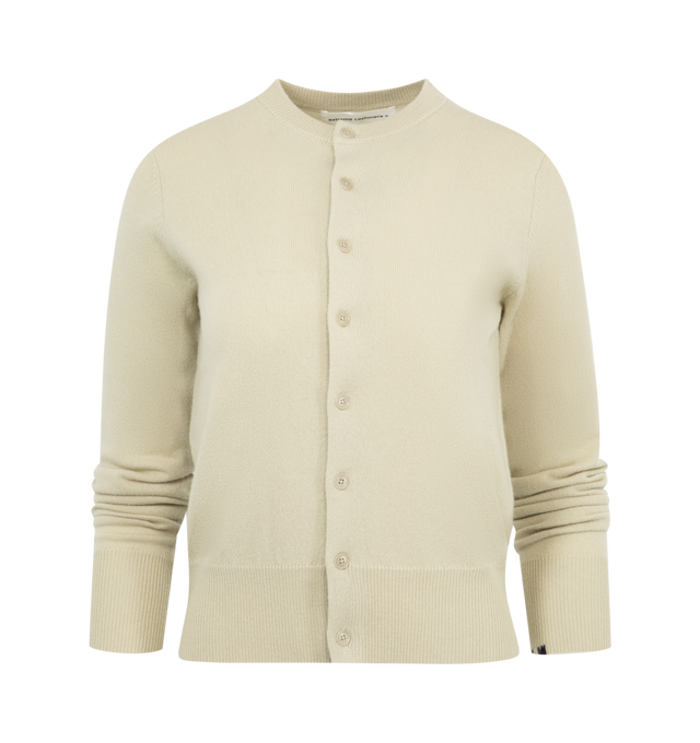 Image 1 of 2 - NEUTRAL - EXTREME CASHMERE Little 2 Sweater featuring classic cashmere crew-neck cardigan with eight buttons and a petite fit. 100% cashmere. 