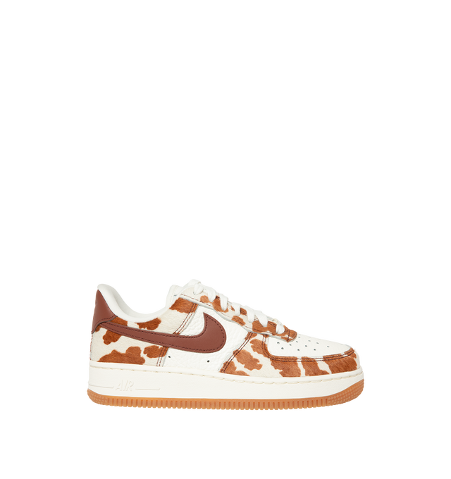 Image 1 of 5 - BROWN - Nike Womens Air Force 1 Sneakers are crafted from pony hair leather with smooth leather overlays. Feature a low-top silhouette, Nike Air cushioning, padded collar, stitched overlays, and a durable rubber cupsole. Main Material: Pony Hair Leather, Leather; Outsole: Rubber. Imported. 