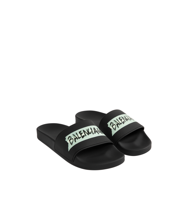 Image 2 of 4 - BLACK - BALENCIAGA Pool Slide Sandal featuring molded rubber footbeds, Balenciaga masking tape artwork on the strap and tone-on-tone sole and insole. Polyurethane, TPU. Made in Italy. 