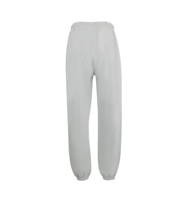 Image 2 of 3 - GREY - Fear of God Essentials Womens Sweatpants have an elastic drawstring waistband, side pockets, and a graphic screen printed on the leg. 