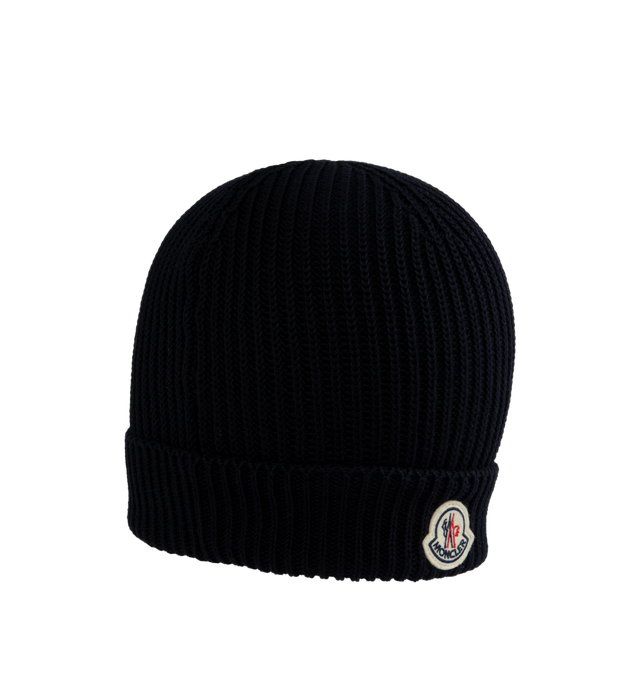 Image 2 of 2 - NAVY - MONCLER Embroidered Monogram Beanie featuring cotton corduroy, brioche stitch, Gauge 5 and felt logo patch. 100% cotton. 