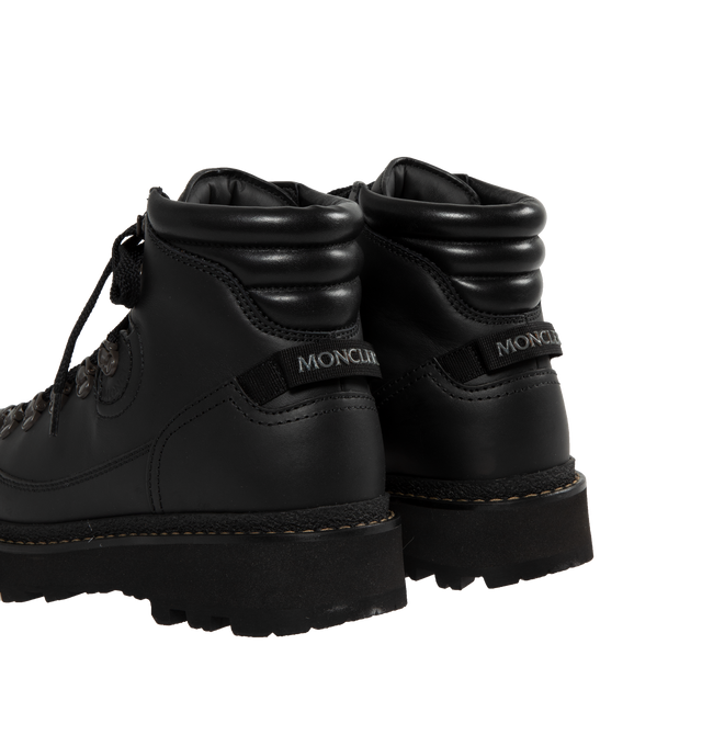 Image 3 of 4 - BLACK - MONCLER Peka Excursion Boots featuring suede and nylon upper, leather lining insole, lace closure, leather welt, micro rubber midsole, and Vibram rubber tread. Sole height 5.5 cm. 100% polyamide/nylon. Lining: cow. Sole: 100% elastodiene. 