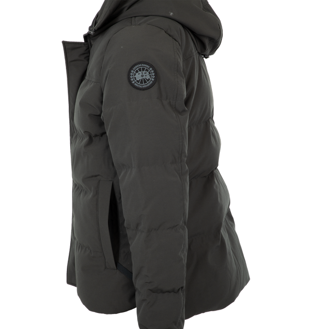 Image 3 of 3 - GREY - CANADA GOOSE MacMillan Parka featuring adjustable down-filled Snorkel hood, hood features a removable zipper guard for the option of changing your hood trim for a customized look and added protection, chin guard is lined with tricot fabric, sleek interior hanging lining with backpack straps, placket with snap closures over 2-way zipper, storm flap underneath 2-way zipper, sleeve cuffs reinforced with CORDURA fabric, sip-length, cut longer in the back, 2 exterior fleece lined front pock 