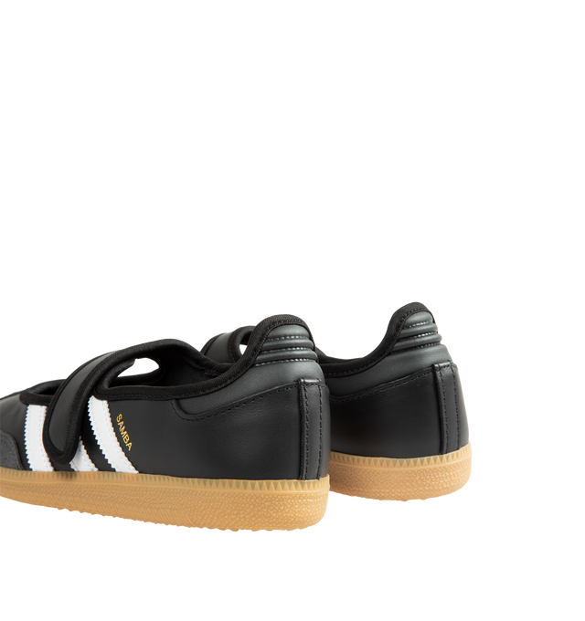 Image 3 of 5 - BLACK - Adidas Women's Samba Jane Shoes are crafted from smooth leather and feature a modern Mary Jane-inspired interpretation of the iconic Samba silhouette. Designed with signature serrated 3-Stripes, a low-profile shape, satin lining, and a gum rubber outsole, this style blends the heritage of the original indoor trainer with a contemporary everyday aesthetic. 