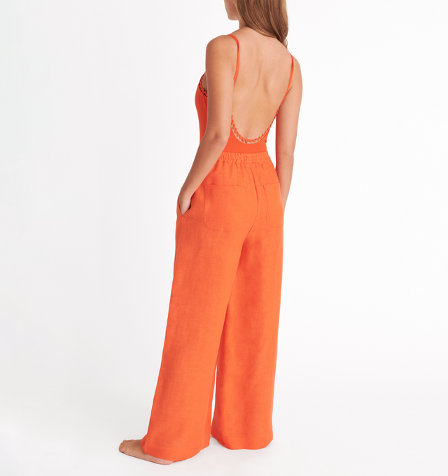 Image 4 of 5 - ORANGE - ERES Select Wide Pants featuring two patch pockets at the front and back, wide hems at the bottom and elastic at the waist. 100% Linen. Made in Bulgaria. 