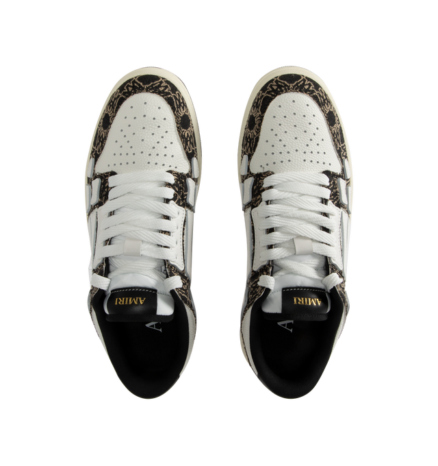 Image 5 of 5 - BLACK - Amiri MA Quad Skel Top Low Sneakers are a lace-up style with leather and denim panels, perforated details, signature graphics, and 2-tone rubber soles. 100% cotton. Made in Vietnam.  