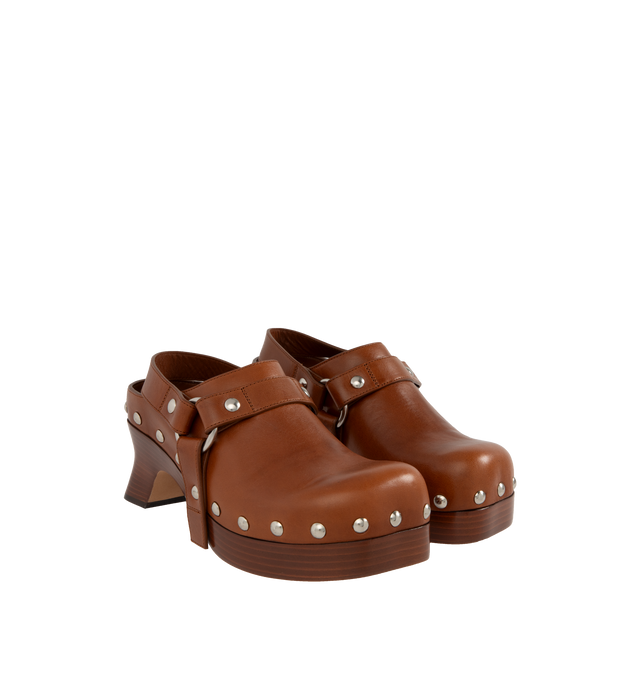 Image 2 of 4 - BROWN - LOEWE Clog in vegetal-tanned calfskin with a chunky monoblock sole and all around studs on the upper, a slingback strap and slanted heel. Featuring 70mm heel with lasered Anagram on the back of the heel, leather insole and outsole. Made in Italy. 