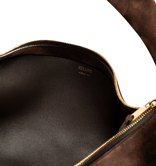 Image 3 of 3 - BROWN - Khaite Olivia slouchy zip-top hobo bag in velvety suede. With integrated strap to wear over the shoulder or carry by hand. Signature hardware at zipper pull. Suede (100% kid leather). Made in Italy. 