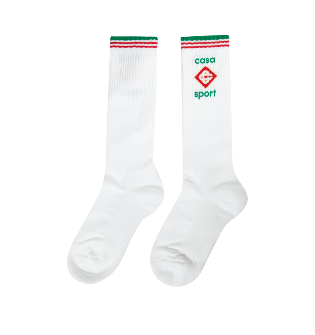 WHITE - CASABLANCA Ribbed Sport Socks featuring calf-high stretch cotton-blend socks with jacquard stripes and logo graphic at rib knit cuffs. 80% cotton, 17% polyamide, 3% elastane. Made in Italy.