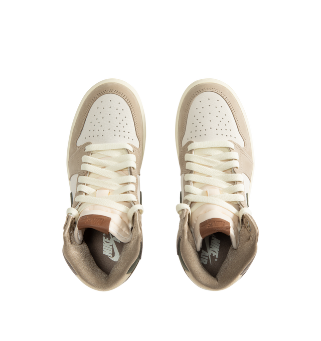 Image 5 of 5 - NEUTRAL - Women's Air Jordan 1 Retro High OG Sneakers feature a premium leather upper with suede overlays, a high-top silhouette, and signature Air Jordan Wings branding for a timeless heritage look. These lifestyle sneakers combine encapsulated Air-Sole cushioning, a perforated toe box, and a durable rubber outsole for lightweight comfort, breathable support, and reliable traction on and off the court. Main Material: Genuine Leather and Suede. Midsole: Encapsulated Air-Sole Unit. Sole: Rubbe 
