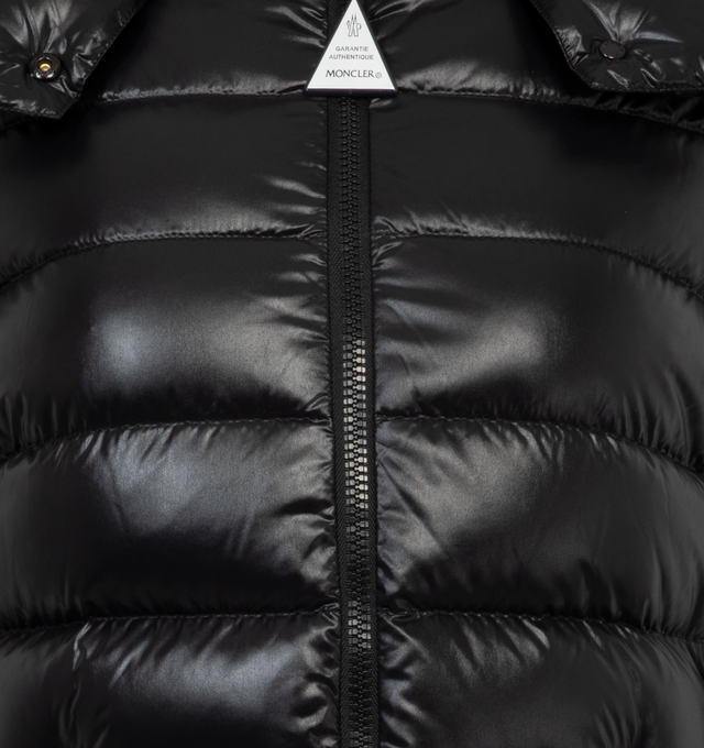 Image 3 of 3 - BLACK - MONCLER Bady Jacket featuring nylon laqu lining, down-filled, detachable hood with snap buttons, adjustable with elastic drawstring fastening, patch flap pocket on the sleeve, zipper closure, double pocket with zipper closure and adjustable elastic cuffs with snap buttons. 100% polyamide/nylon. Padding: 90% down, 10% feather. 