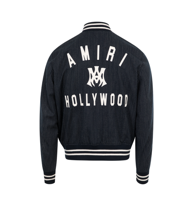 Image 2 of 3 - BLUE - Amiri MA Hollywood Pinstripe Bomber Jacket has a ribbed stand collar, a button front closure, side pockets, brand applique artwork, and ribbed trims. Made in Italy.  