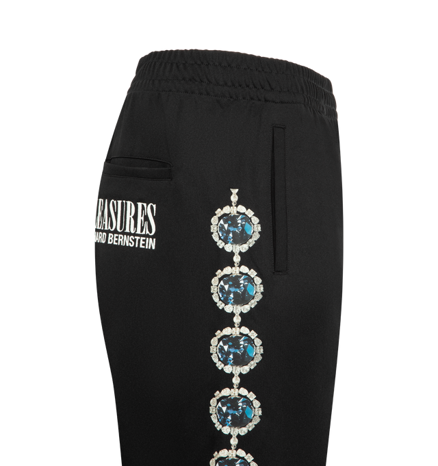 Image 3 of 4 - BLACK - PLEASURES x Richard Bernstein Mythic Hope Track Pants featuring giant jewels cascade down the legs, relaxed fit, elastic waist with internal drawcord, side-seam pockets and back patch pocket. 100% polyester. 