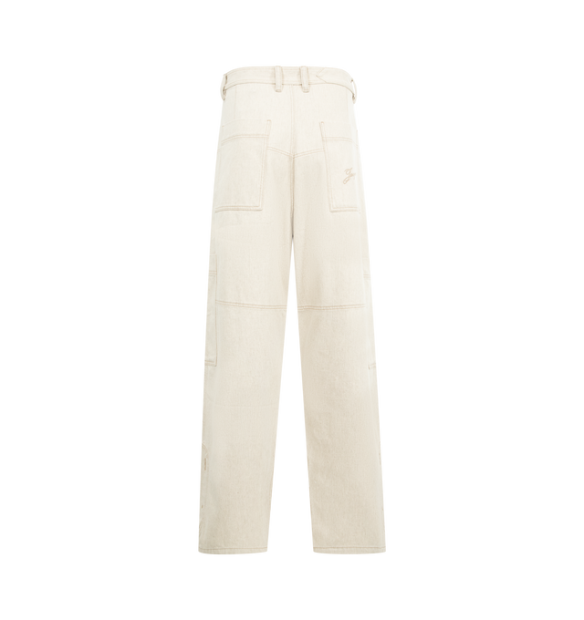 Image 2 of 3 - WHITE - JACQUEMUS Carr de-Nmes Denim Cargo Pants featuring high-rise, soft cotton-hemp denim, belt loops, engraved metal button fly, slant pockets, wide straight legs, reinforcement stitching around the knee, side patch pockets, embroidered patch on the back, back patch pockets with laser-printed logo and contrast topstitching. 80% cotton, 20% hemp. Lining: 65% polyester, 35% cotton. Made in Portugal. 