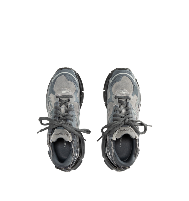 Image 5 of 5 - GREY - BALENCIAGA Runner Sneaker in grey suede cowskin, polyurethane and polyester featuring worn-out effect, printed size at the edge of the toe, debossed size at back, runner logo printed on exterior, Balenciaga logo embroidered on the tongue, Balenciaga logo at the back of the heel and Back pull-on tab. Upper: cowskin, polyurethane, polyester. Sole: rubber, TPU, EVA, polyurethane. Insole: foam. Made in China. 