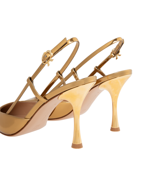 Image 3 of 4 - GOLD - GIANVITO ROSSI Ascent Metal Pump featuring an hourglass heel, pointed-toe, slingback, ribbon buckle in gold metal on the ankle strap. Heel height: 3.3 inches/85 mm. 100% calf. 