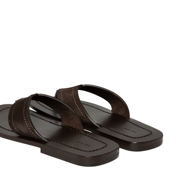 Image 3 of 4 - BROWN - The Row Mens Dan Flip Flop is crafted from calfskin suede. Feature a slip-on silhouette, lambskin leather lining, and calfskin leather sole. Main Material: Calfskin Suede; Lining: Lambskin Leather; Sole: Calfskin Leather. Made in Italy. 
