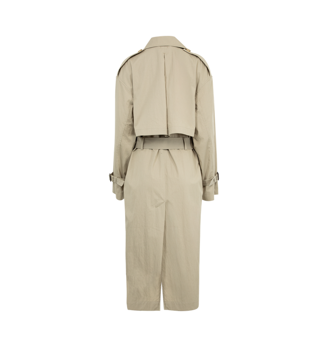 Image 2 of 3 - NEUTRAL - TOTEME Crisp Summer Trench featuring double-breasted button front, welt pockets, epaulettes, waist and cuff belts, inverted box pleat, t-stitch and light, water-resistant fabric. 65% cotton organic, 35% polyamide. Made in Portugal. 